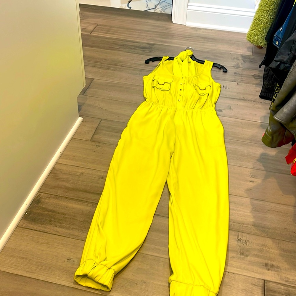 Bebe , bright yellow jumpsuit. W/elastic waist band sm